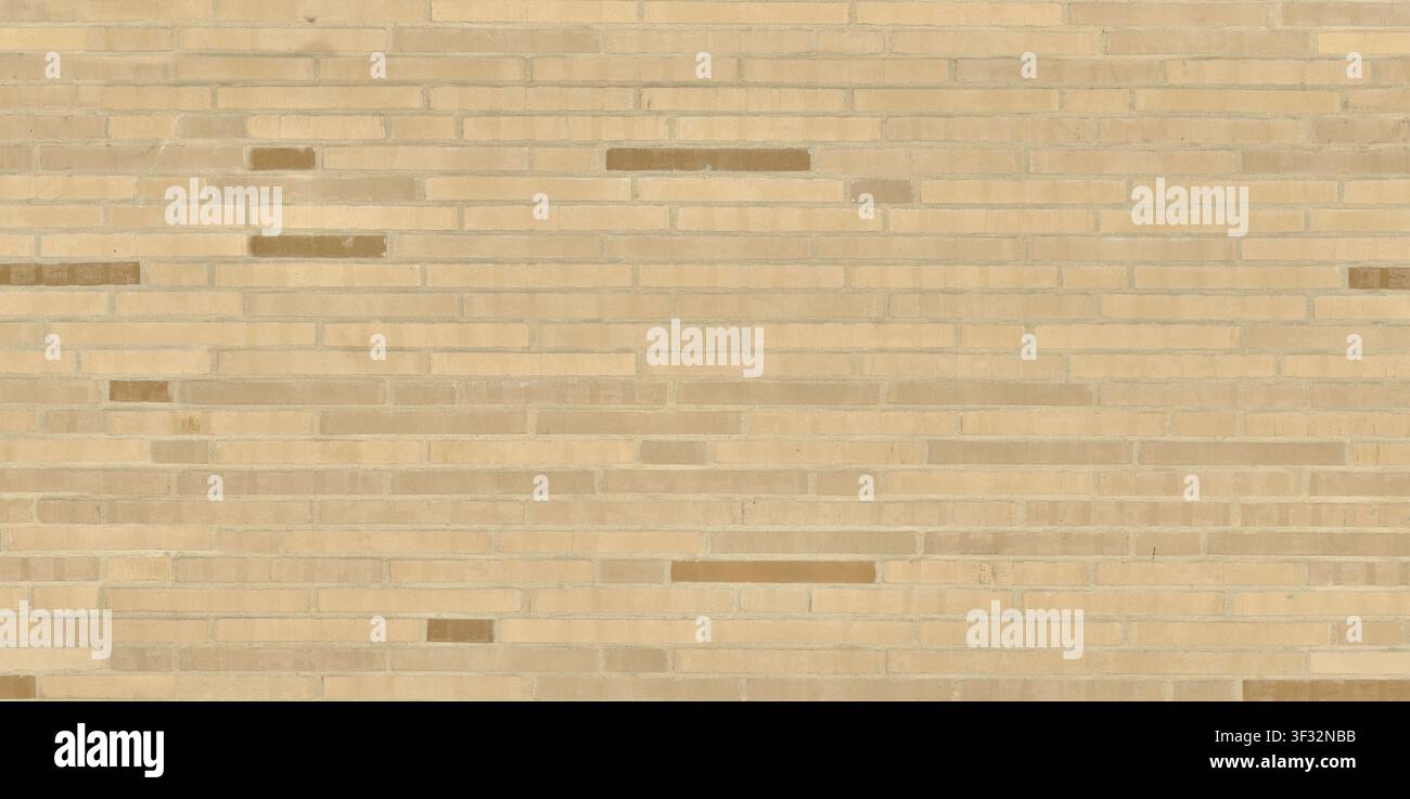 Une texture sans joint de briques de couleur beige clair ou brun formant un mur. Banque D'Images