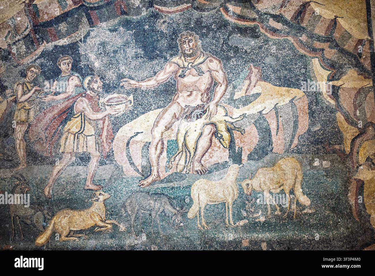 Ulysse et son équipage offrent du vin au Cyclope Polyphème pour l'enivrer & faciliter leur évasion de sa grotte, Villa Romana del Casale, Piazza A Banque D'Images