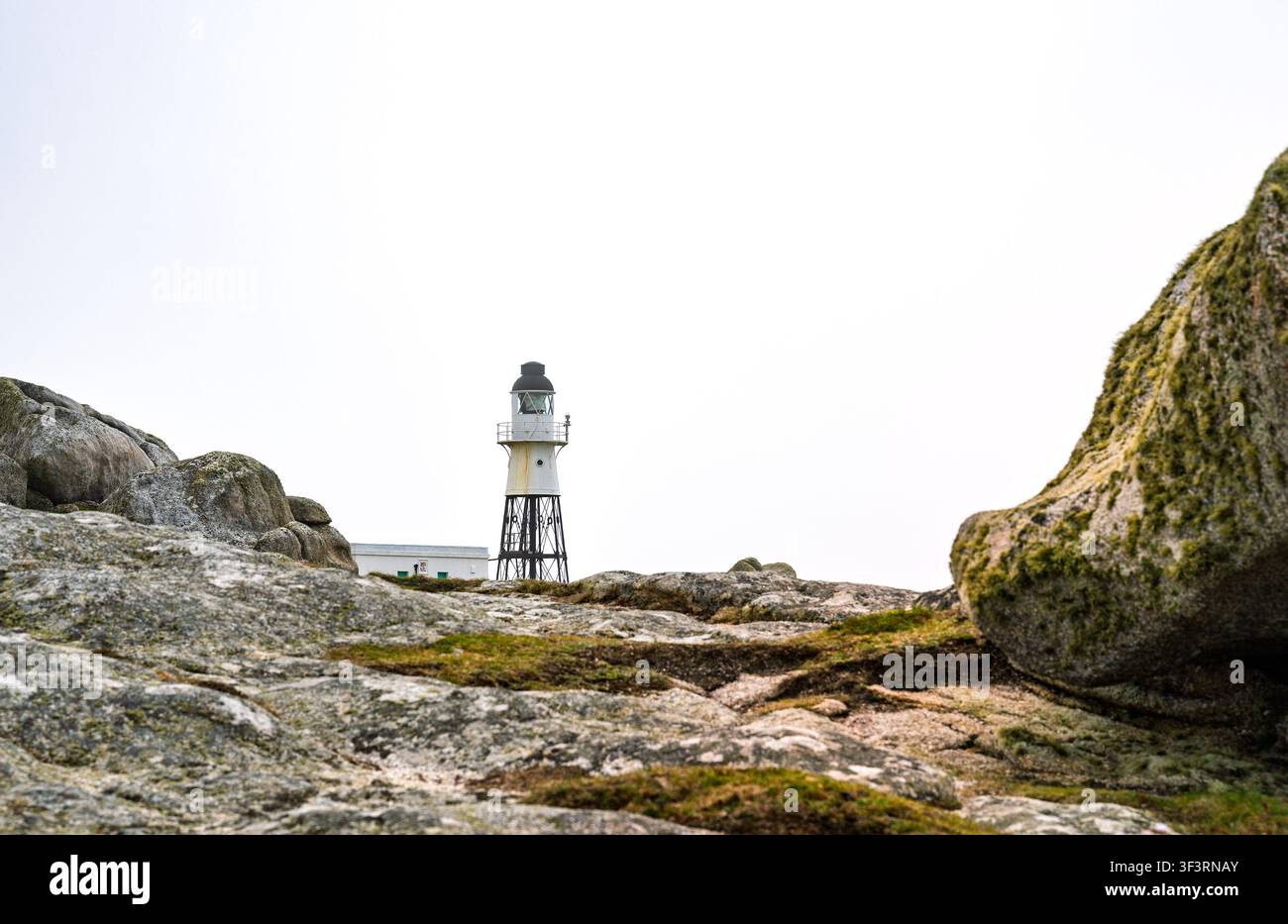 Le phare de Peninnis a été construit par Trinity House en 1911 pour aider les navires entrant dans le port de Hugh Town par le détroit de St Mary's. St Mary's, Îles Scilly, Royaume-Uni. Banque D'Images