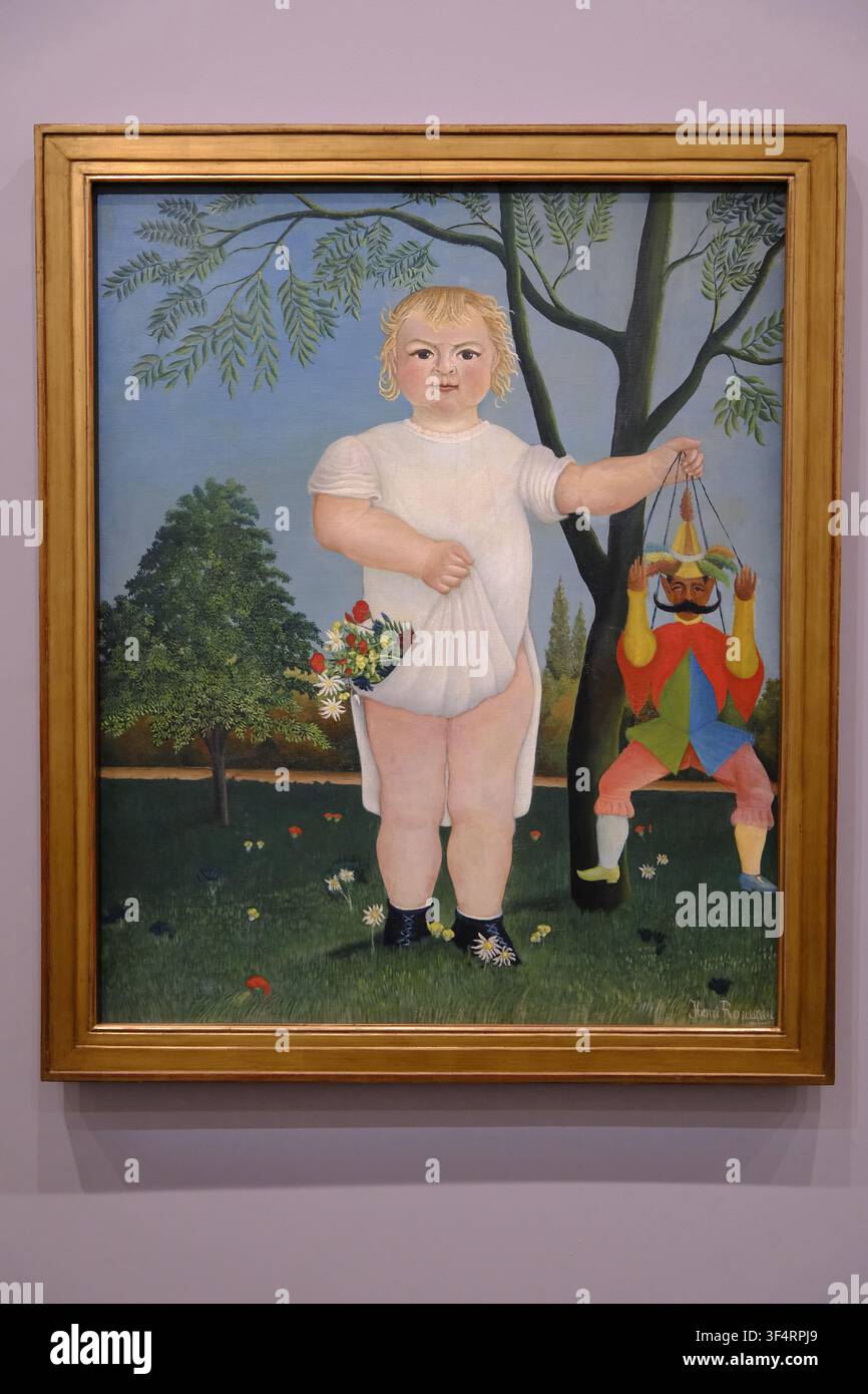 *L'Enfant avec la poupée* (Pour célébrer le bébé !) par Henri Rousseau, 1903. Huile sur toile Banque D'Images