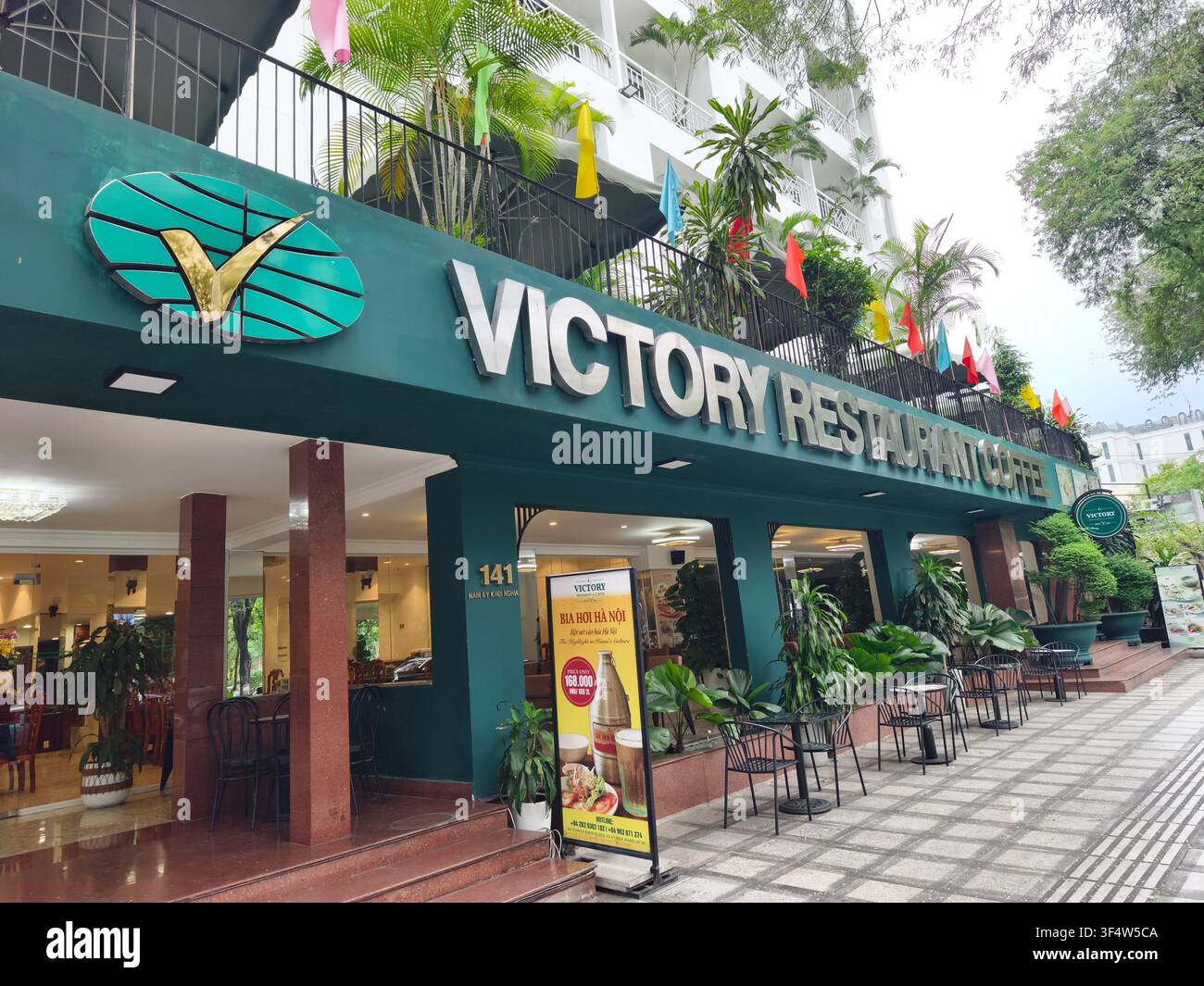 Victory Restaurant & Coffee, situé à la base du Victory Saigon Hotel à Hô Chi Minh-Ville, Vietnam Banque D'Images