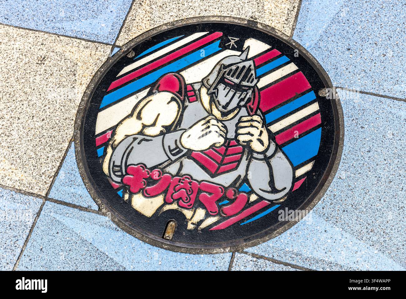 Osaka Japon - 3 juillet 2026 - Couverture d'égout Kinnikuman masque Robin Banque D'Images