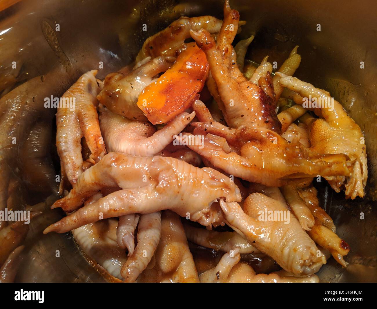 Pieds de poulet cuits Banque D'Images