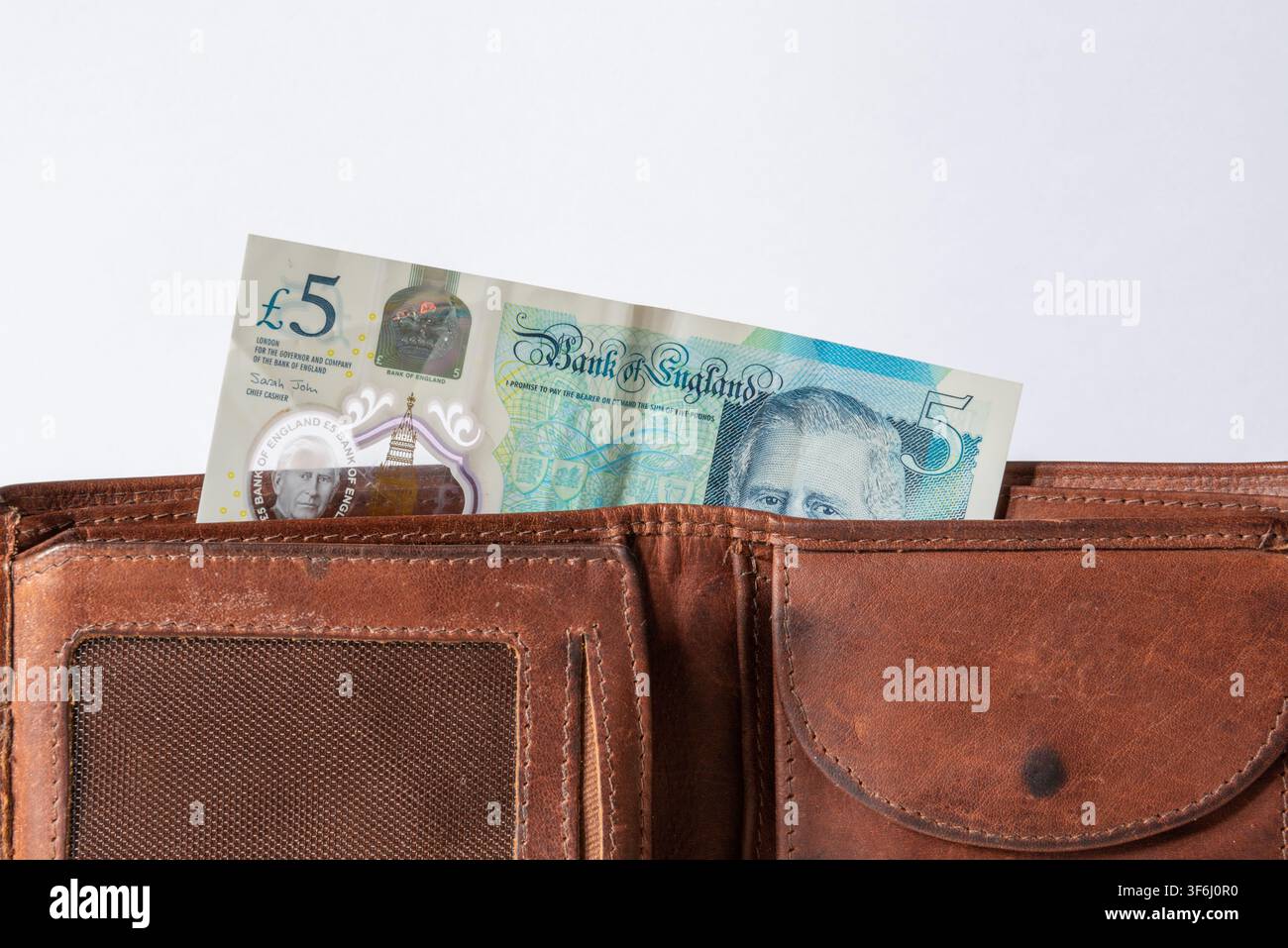 Portefeuille avec des billets en livres sterling Banque D'Images
