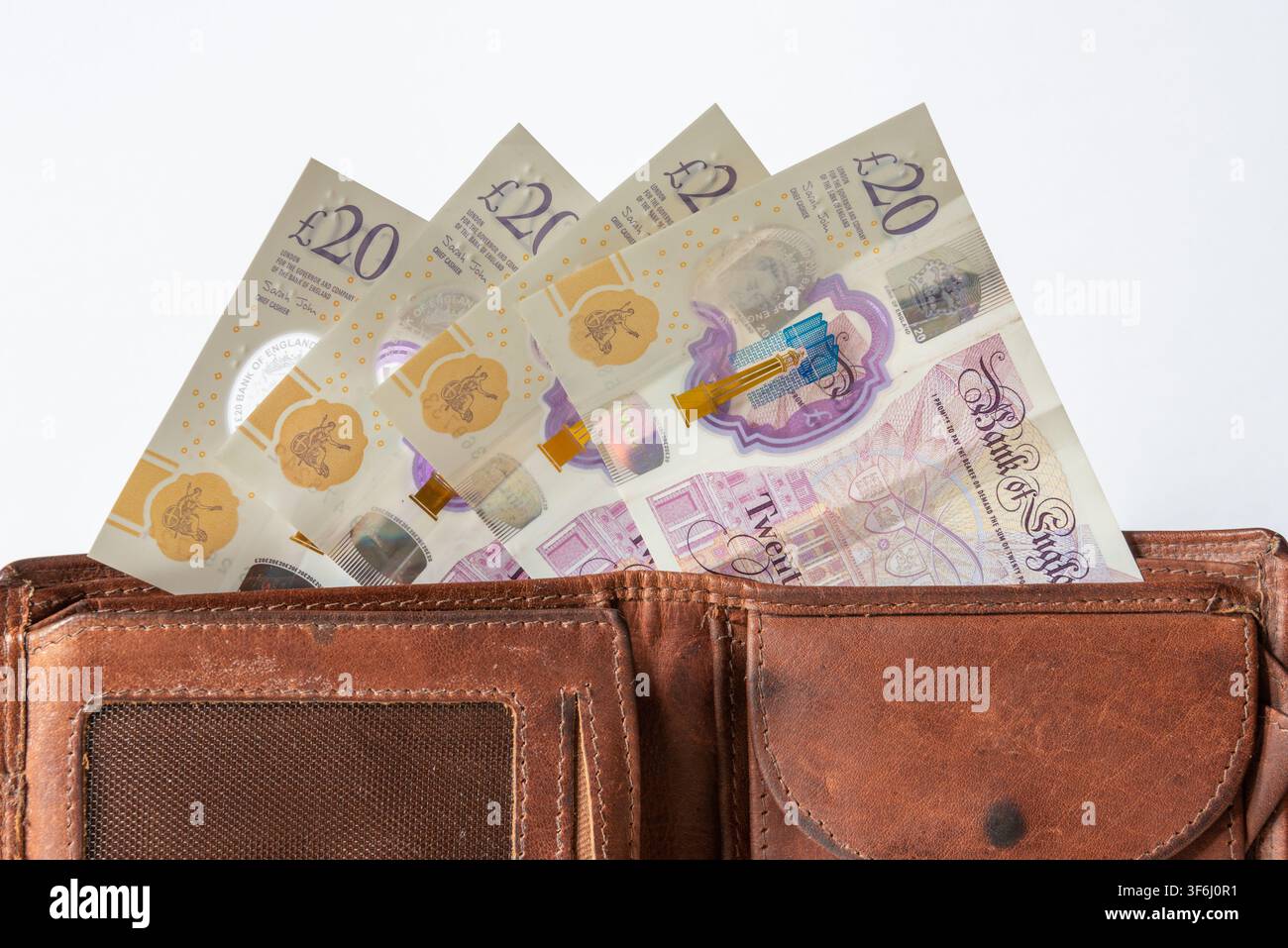 Portefeuille avec des billets en livres sterling Banque D'Images