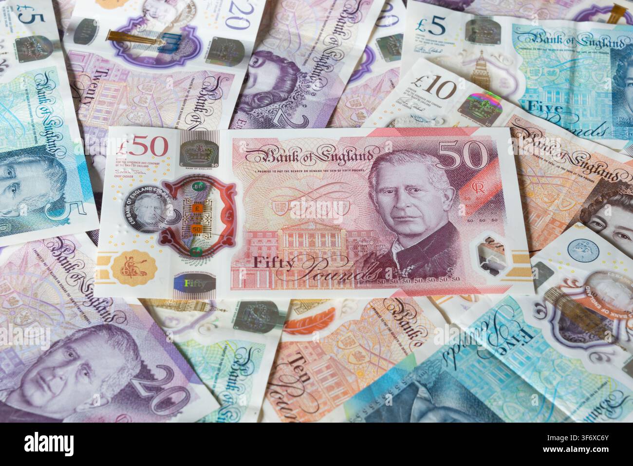 Billets et pièces en livres britanniques Banque D'Images