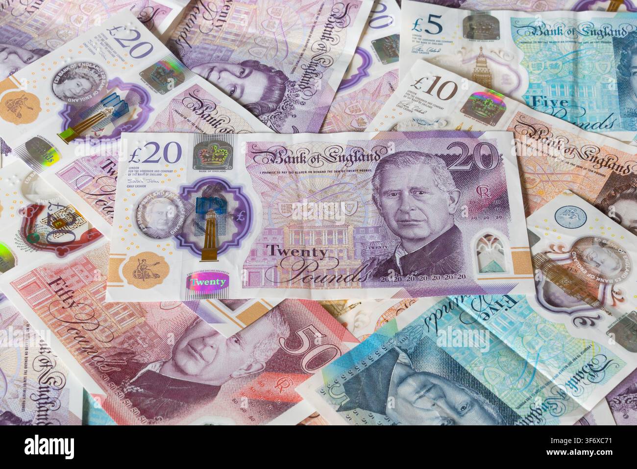 Billets et pièces en livres britanniques Banque D'Images