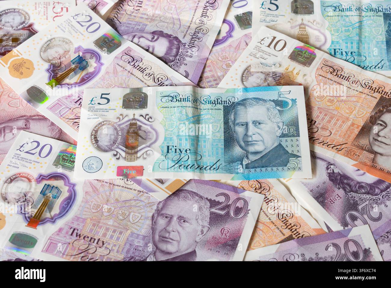 Billets et pièces en livres britanniques Banque D'Images