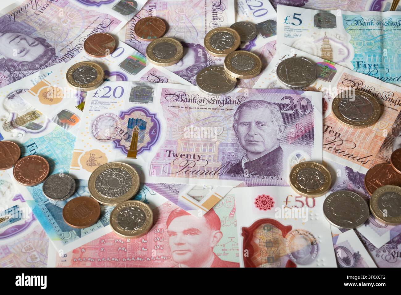 Billets et pièces en livres britanniques Banque D'Images