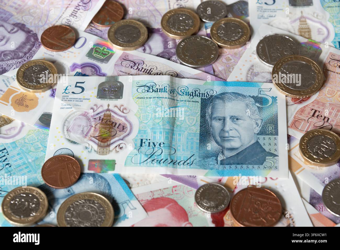 Billets et pièces en livres britanniques Banque D'Images