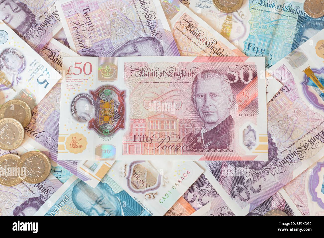 Billets et pièces en livres britanniques Banque D'Images