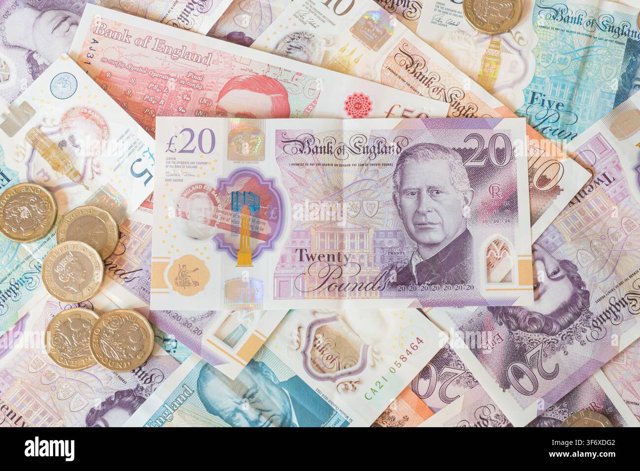 Billets et pièces en livres britanniques Banque D'Images