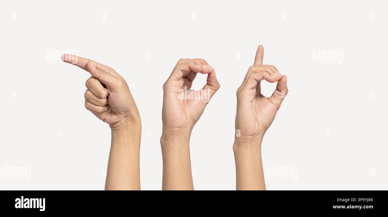 Lettre "Dieu" de l'alphabet des sourds faite à la main. La lettre "Dieu" en langue des signes, isolée sur fond blanc. Mouvements des mains. Troubles auditifs. Banque D'Images