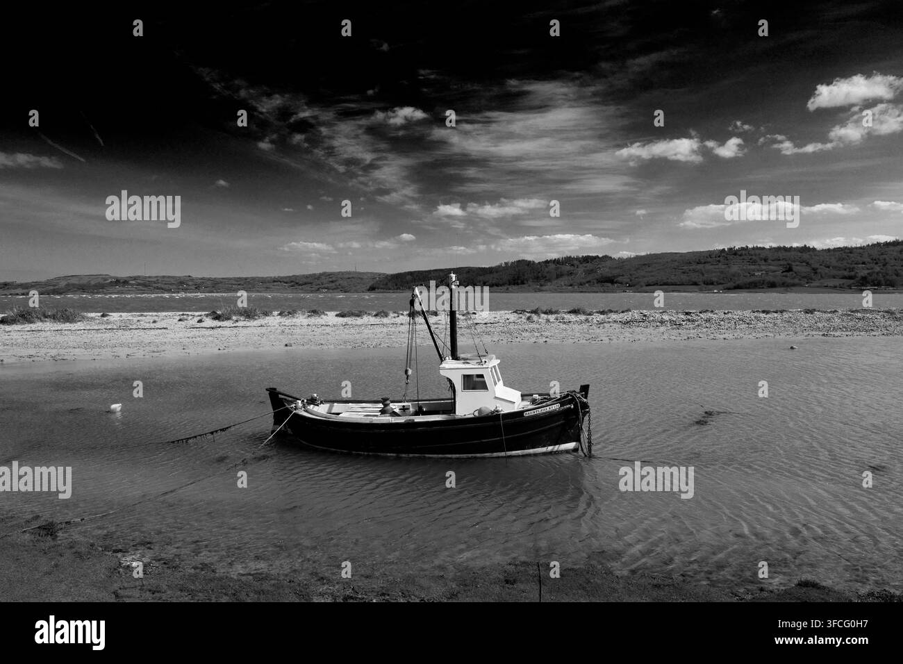 Bateau de pêche à Red Wharf Bay, village de Pentraeth, île d’Anglesey, Pays de Galles, Royaume-Uni Banque D'Images