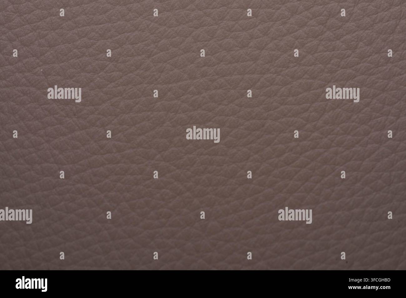 Photo en gros plan d'une surface en simili cuir marron montrant une texture de veining détaillée idéale pour les applications de fond de design et de matériau Banque D'Images