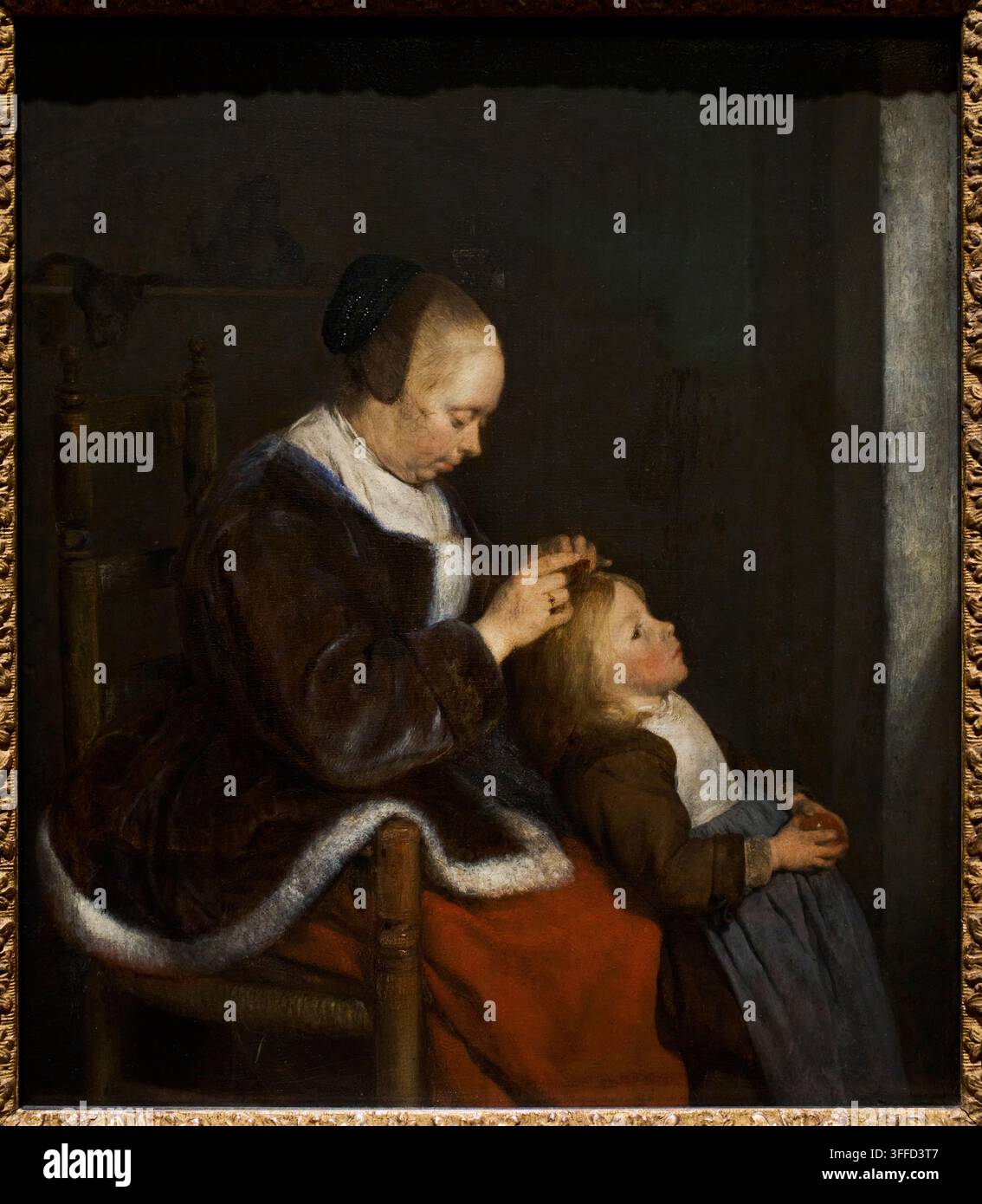 Mère peignant les cheveux de son enfant, (Chasse aux poux), c.1652-1653, Gerard ter Borch (1617-1681), musée Mauritshuis, La Haye, Pays-Bas Banque D'Images