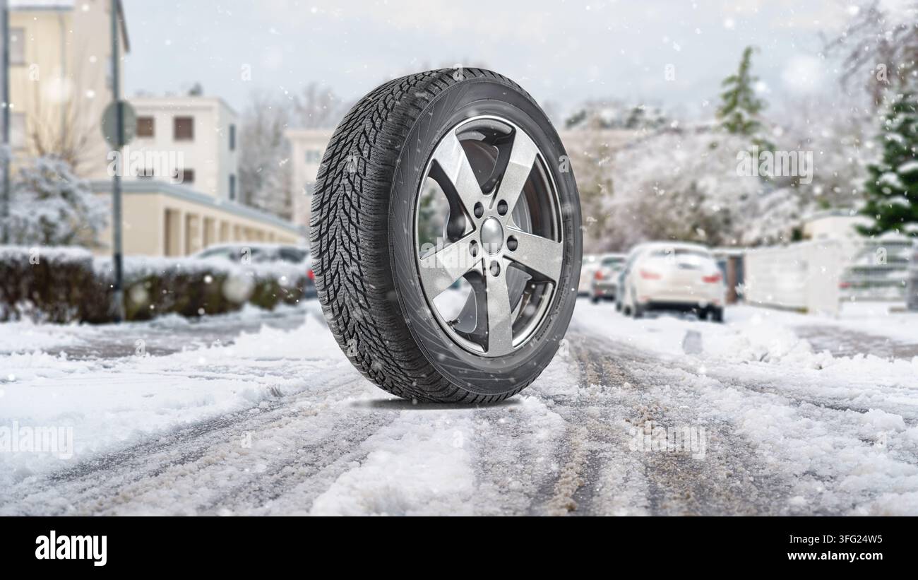 Voitures garées couvertes de neige et gros plan sur des pneus hiver au premier plan - tempête de neige Banque D'Images