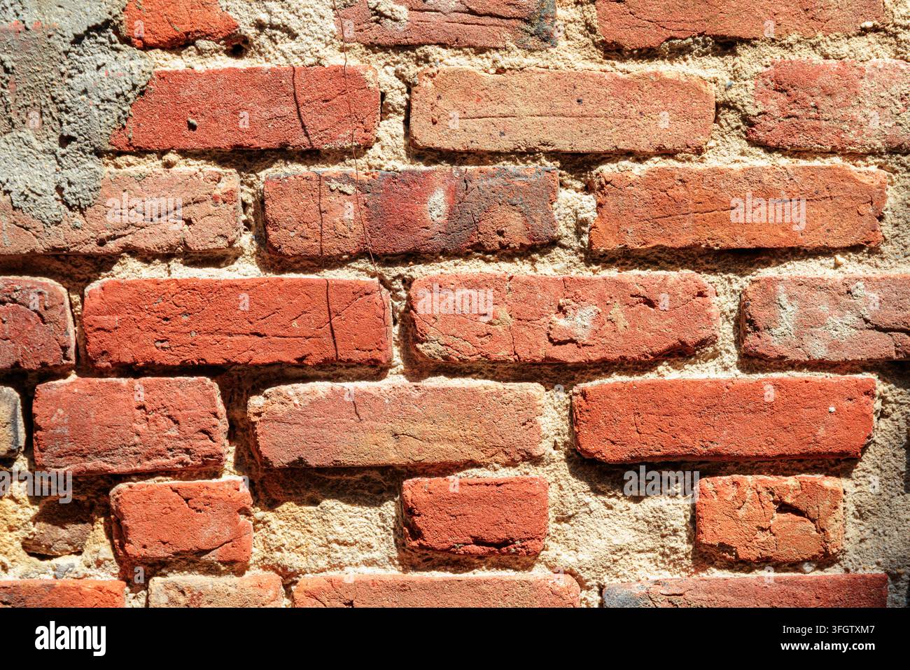 Fond de mur de briques. Surface de maçonnerie en briques rouges Banque D'Images