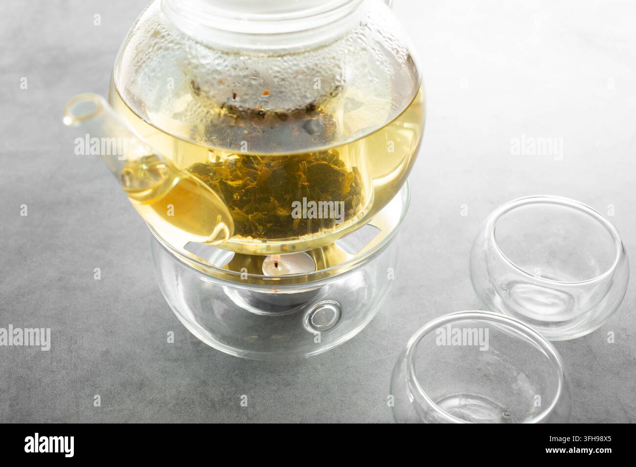 Une vue d'une théière en verre transparent. Banque D'Images