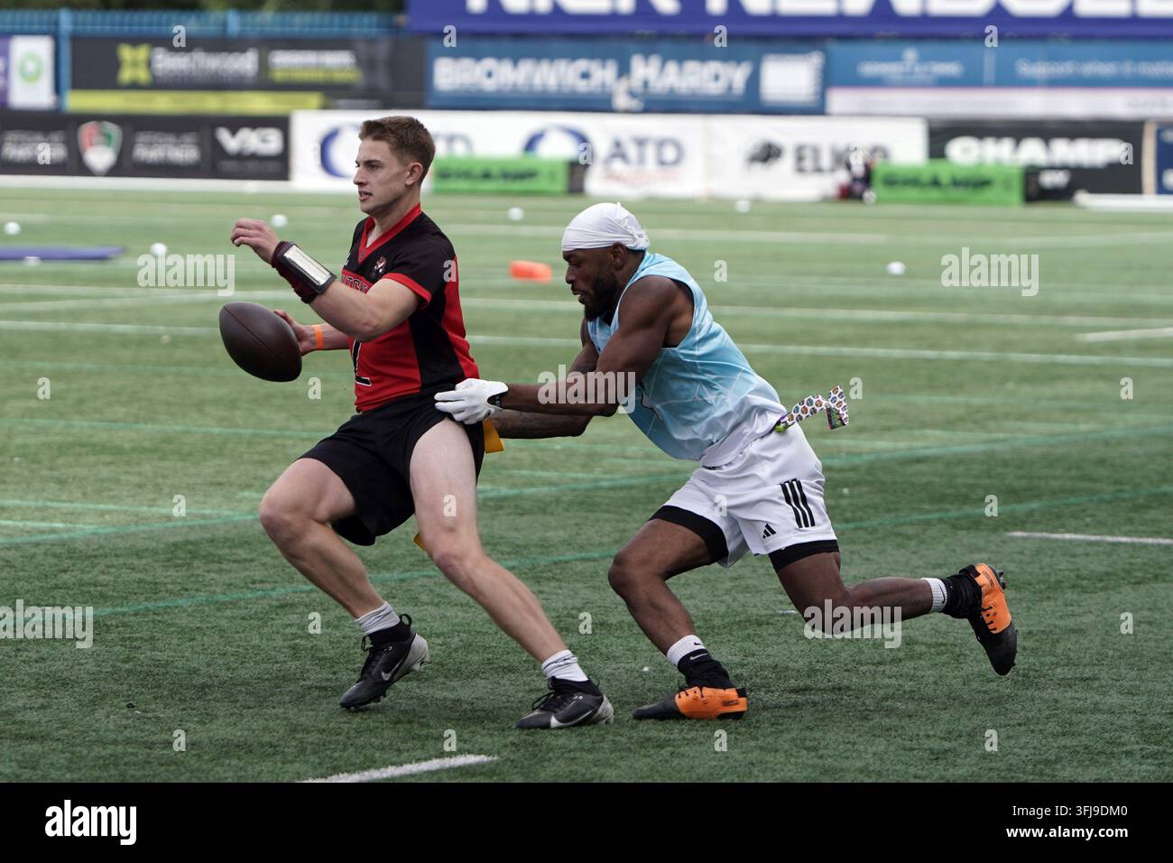 Attaque contre Défense lors de la Journée des Finales de Flag Football de la BAFA Banque D'Images