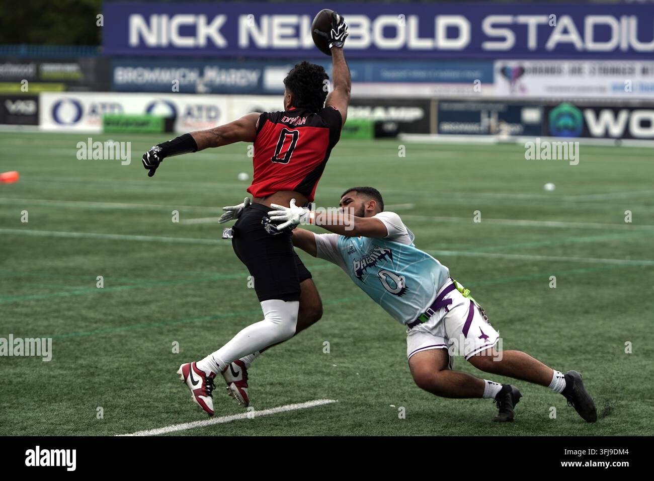 Attaque contre Défense lors de la Journée des Finales de Flag Football de la BAFA Banque D'Images