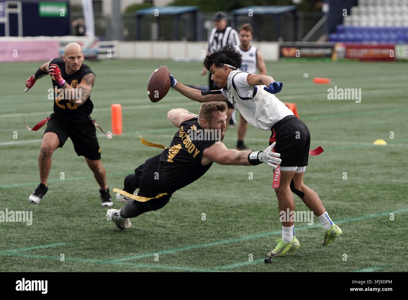 Attaque contre Défense lors de la Journée des Finales de Flag Football de la BAFA Banque D'Images