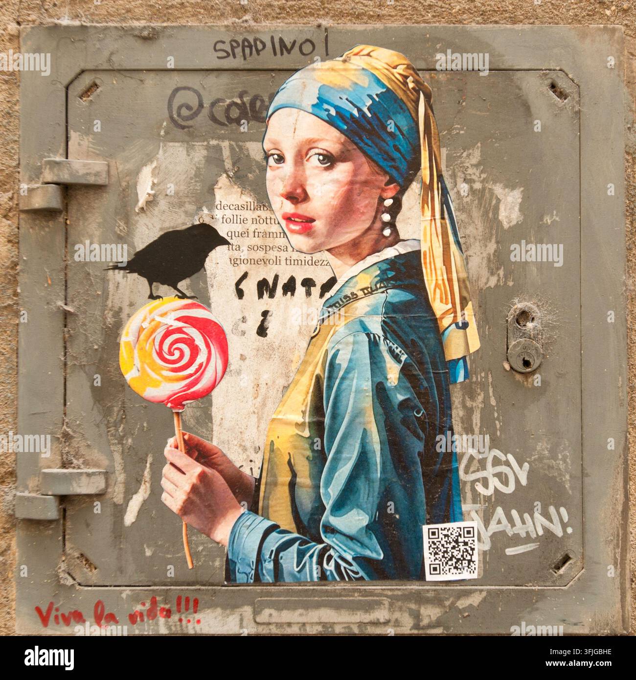 Œuvre d'art de rue de l'artiste Blub, à Florence, qui réinterprète le tableau célèbre de Johannes Vermeer "La jeune fille à la perle". Banque D'Images