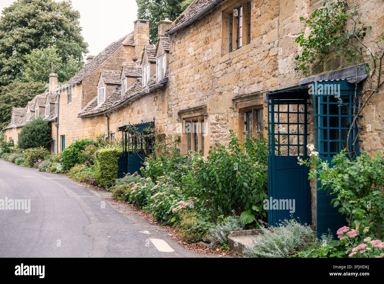 Rangée de maisons dans le village de Stanton dans les Cotswolds, Gloucestershire, Angleterre, Royaume-Uni Banque D'Images
