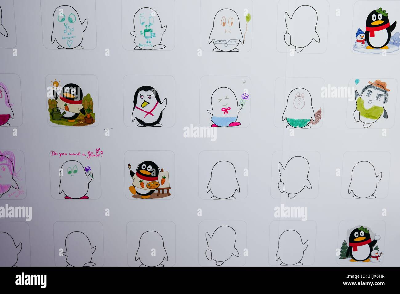 Cologne, Allemagne – 26 août 2026 : Des designs de personnages de pingouins dessinés à la main apparaissent dans une grille, mêlant des illustrations hivernales colorées à des dessins au trait simples Banque D'Images
