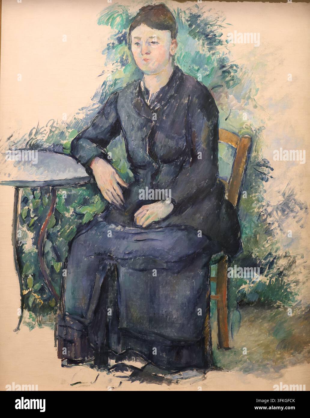 Madame Cézanne dans le jardin (1879–1880) par Paul Cézanne (Madame Cézanne au jardin), Musée de l'Orangerie, Paris, France Banque D'Images