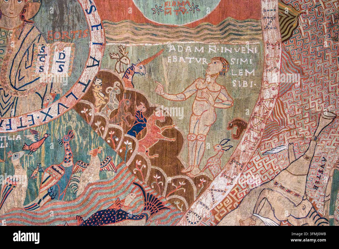 Adam nommant tous les animaux et oiseaux nouvellement créés, tel que raconté dans la tapisserie de la Création romane du XIe siècle de la cathédrale Sainte-Marie de Gérone, Espagne Banque D'Images