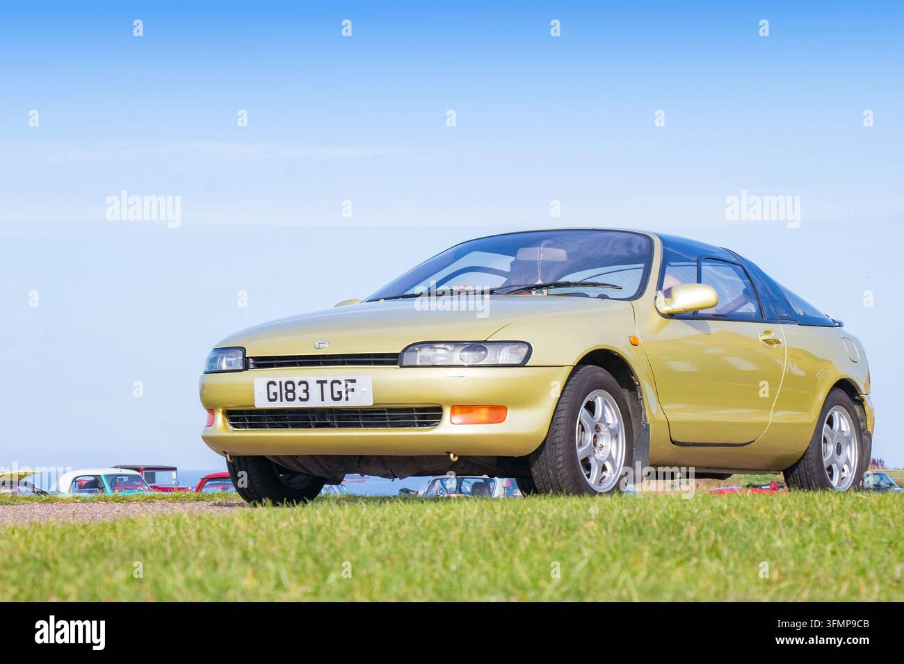 Coupé Toyota Sera doré, importation japonaise, en plein air lors d'un salon automobile à Tynemouth Priory, Northumberland, Royaume-Uni Banque D'Images