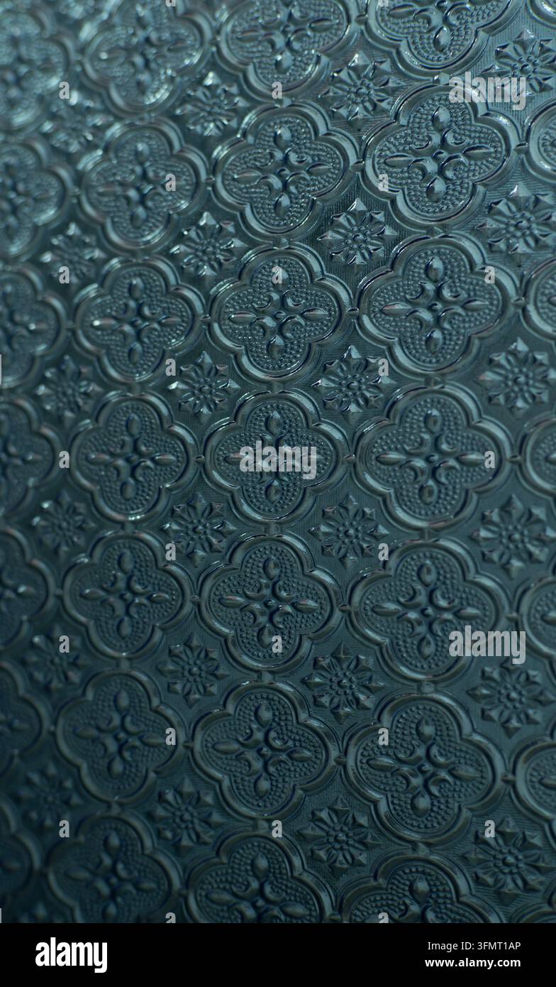 Conception de fond texturé à motif ornemental gaufré gris foncé Banque D'Images