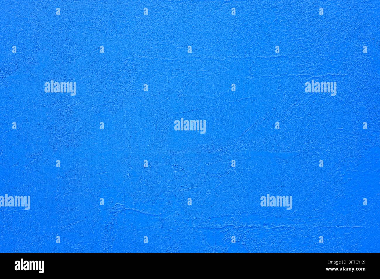 Mur bleu lisse et lumineux comme texture ou fond Banque D'Images