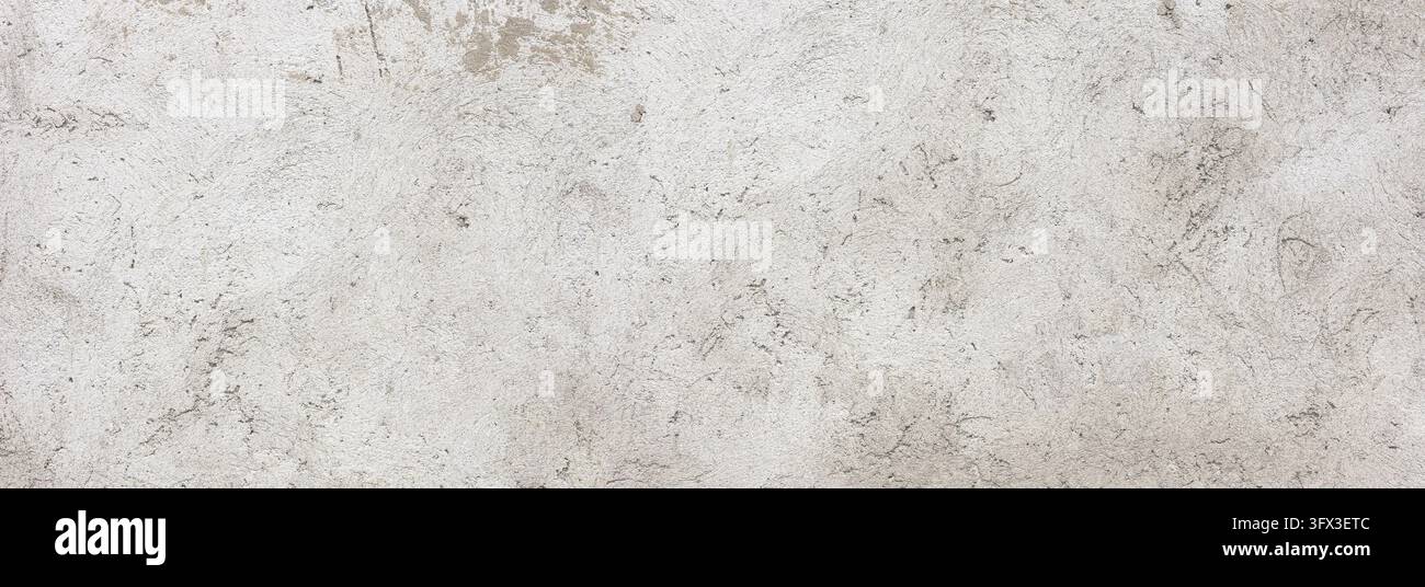 Surface de béton rugueuse montrant la texture et les imperfections subtiles Banque D'Images