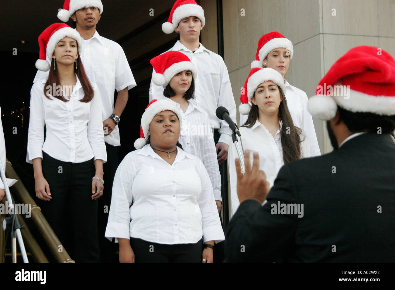 Miami Florida,Coral Gables,Junior Orange Bowl Caroing Competition,étudiant étudiants éducation élève jeunesse,chorus,chanter,groupe,hiver,Noël,personnalisé,ev Banque D'Images
