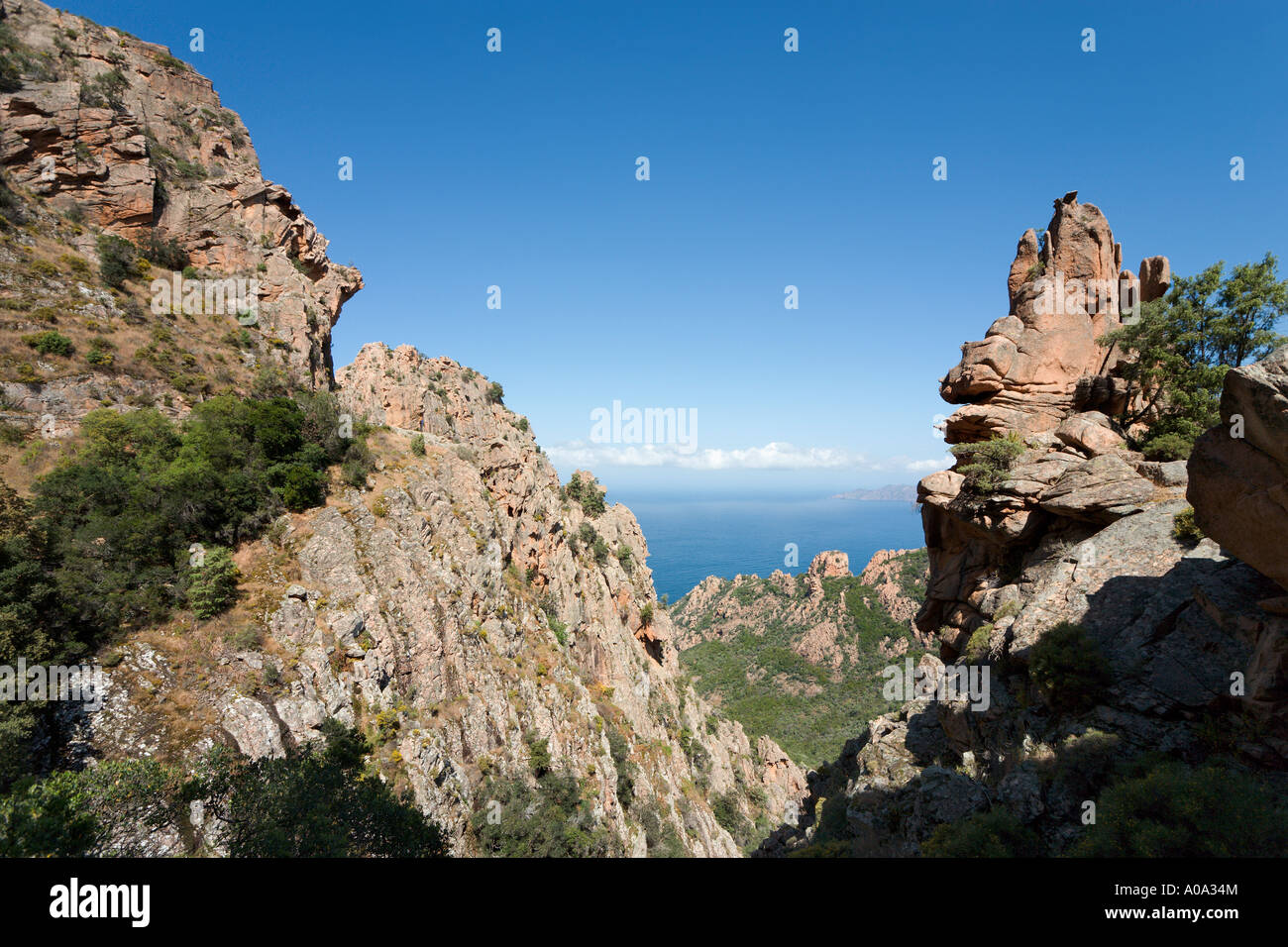 Les Roches Rouges (Roches rouges) sur la route de la côte entre Porto et Piana, golfe de Porto, Corse, France Banque D'Images