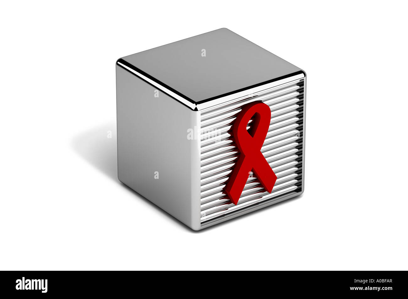 Ruban rouge symbole de la sensibilisation au SIDA sur bloc de jouets Banque D'Images