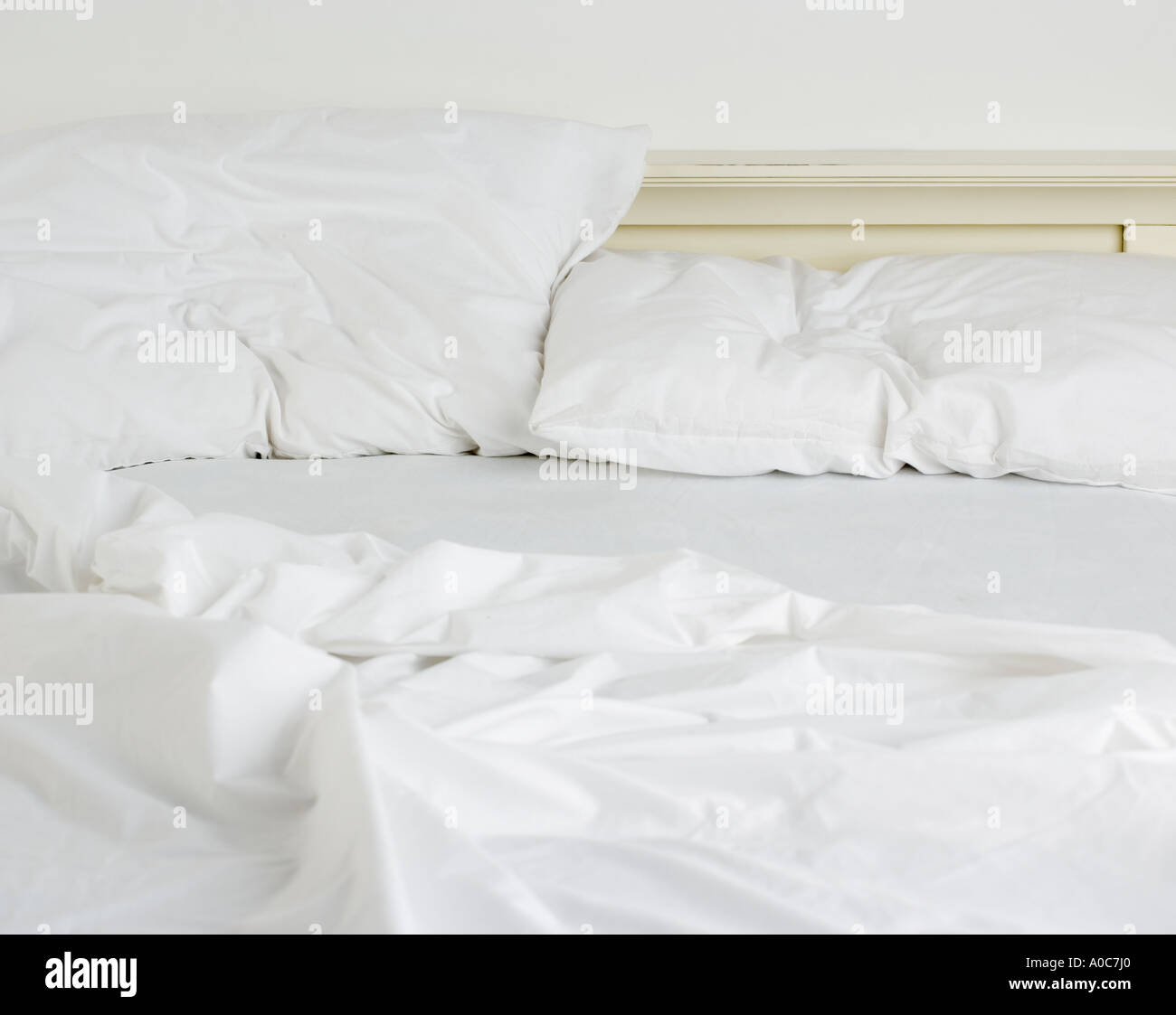 La vie encore d'un lit défait Banque D'Images