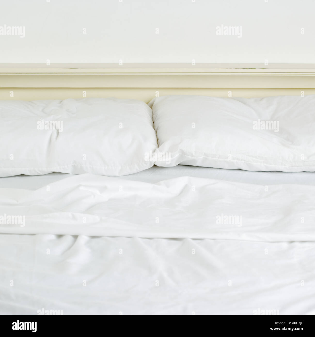 La vie encore d'un lit défait Banque D'Images