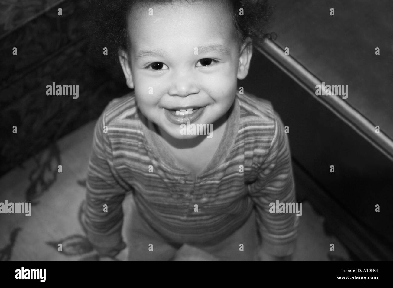 Stock Photo de l'enfant américain d'origine jamaïcaine Smiling at the Camera Banque D'Images