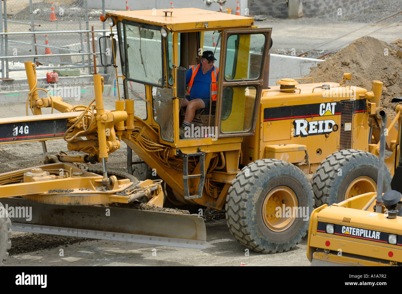 Niveleuses Caterpillar au travail Banque D'Images