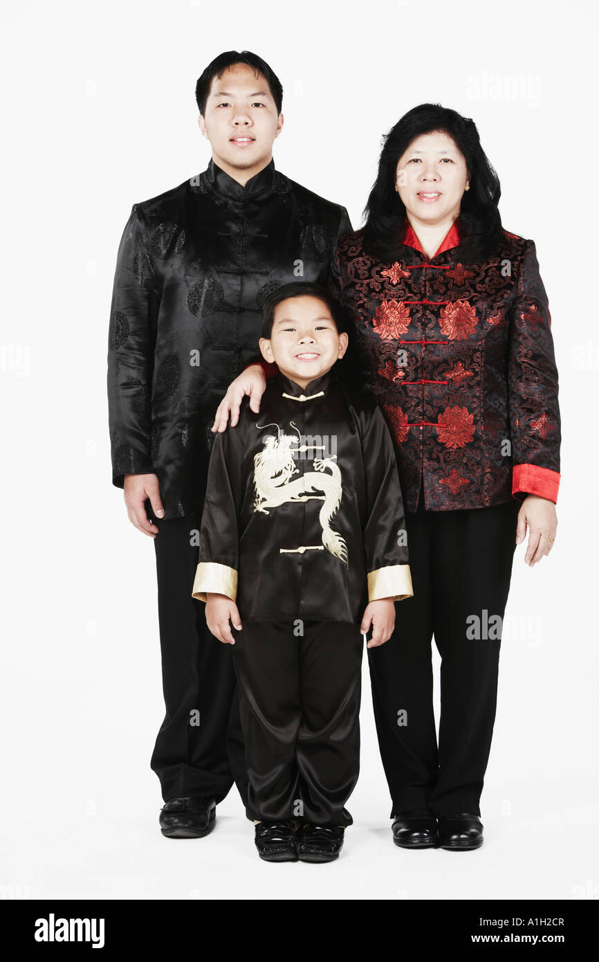 Portrait d'une mère avec ses deux fils smiling Banque D'Images
