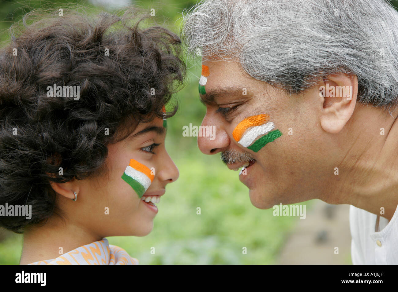 Drapeau sur l'inde peint sur le visage, célébrant la Journée de l'indépendance des Indiens, Inde, MR#191&646 Banque D'Images