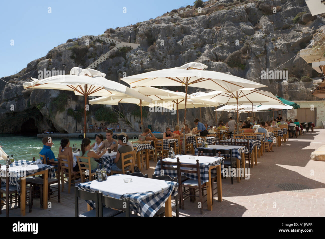 Restaurant en bord de mer, Xlendi, Malte, Gozo Banque D'Images