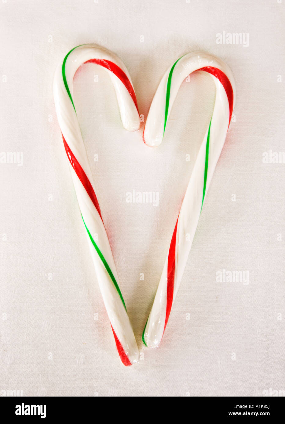 Canne de Noël rouge et vert coeur. Banque D'Images