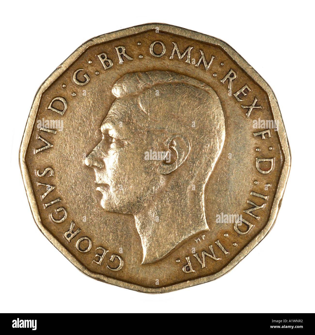 Le roi George VI Reg fid def 3 thrupence pré virgule trois pence penny vieux cuivre P 1945 tête lumineuse laissée omn rex dei Banque D'Images