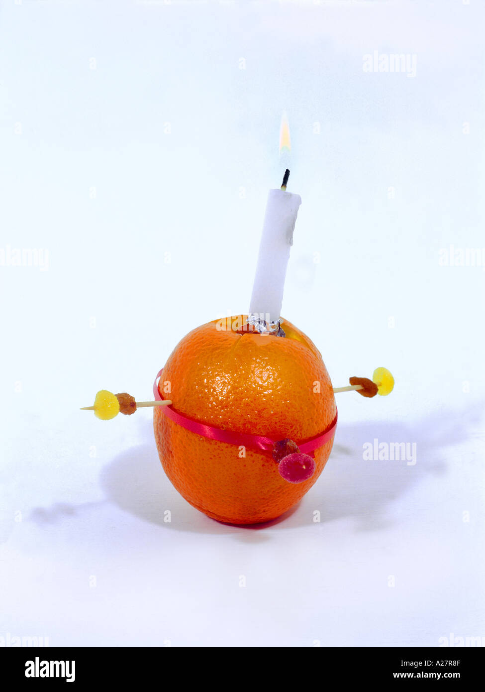 L'orange de Christingle symbolise le monde, la bougie JésusChrist la