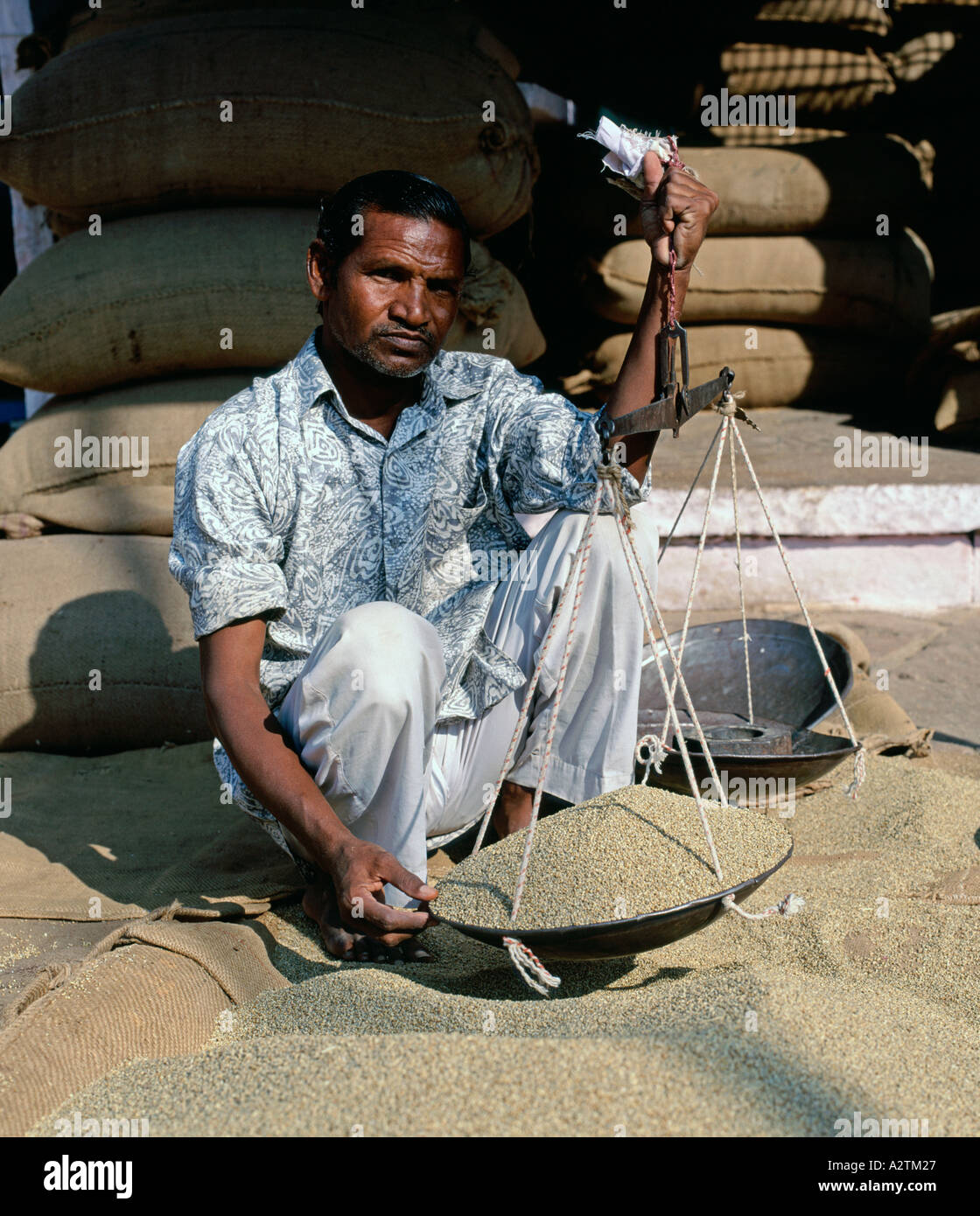 La vente de céréales homme Jodhpur Rajasthan Inde Banque D'Images