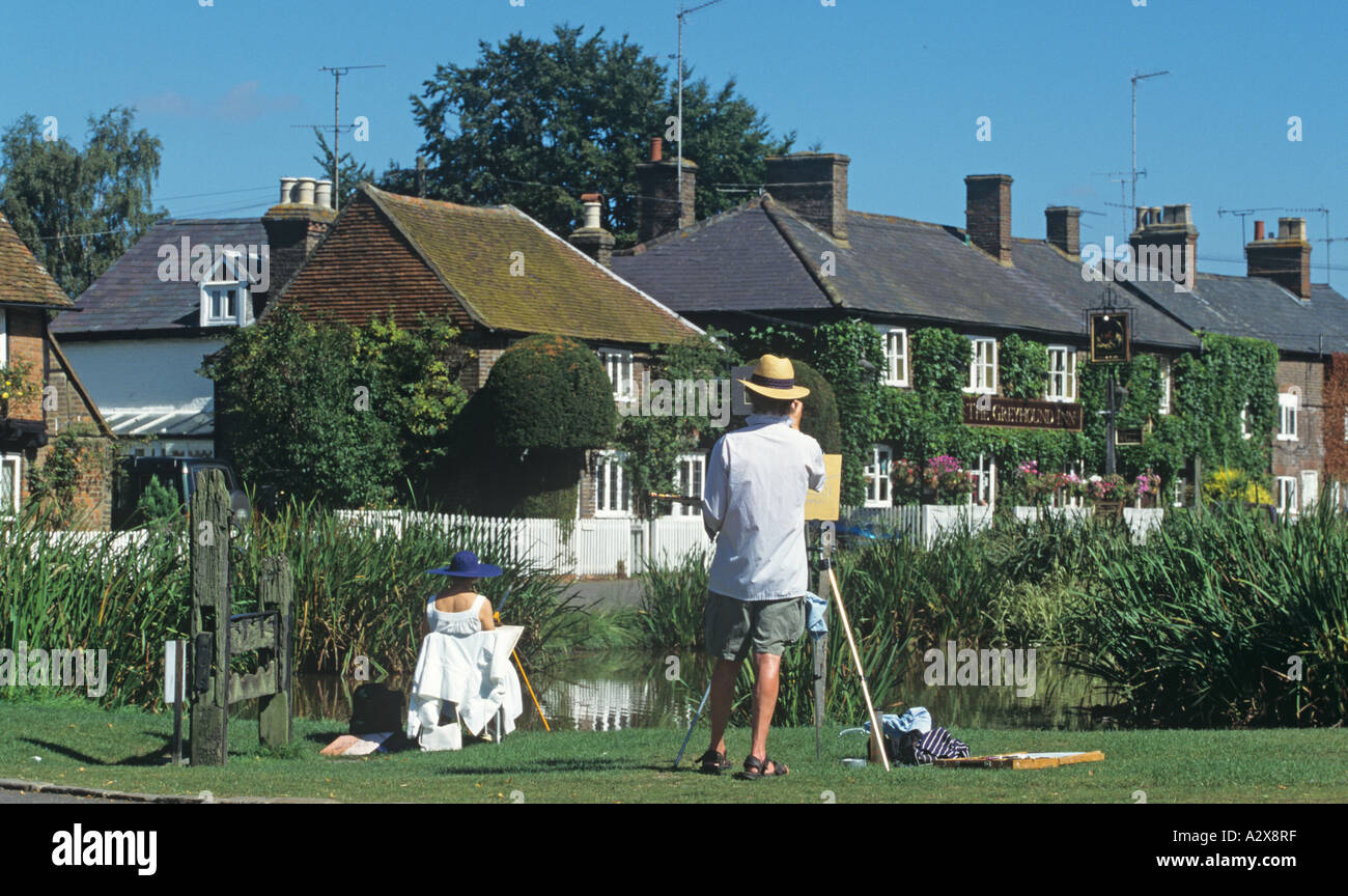 Peintre au travail d'été Hertfordshire Village Essendine Banque D'Images